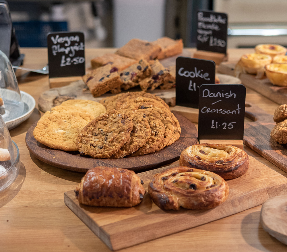 Selection of sweet treats at V Café including flapjacks, cookies and Danish croissants.