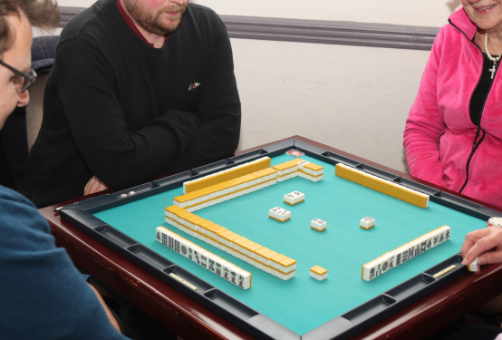 People playing Mahjong