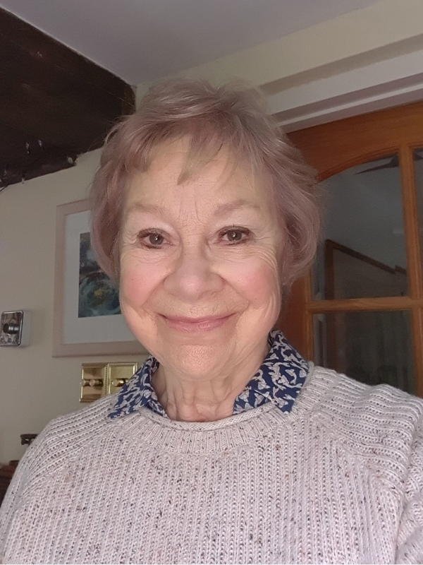 Volunteers' Week: Viv smiling, with short grey hair and wearing a purple jumper.