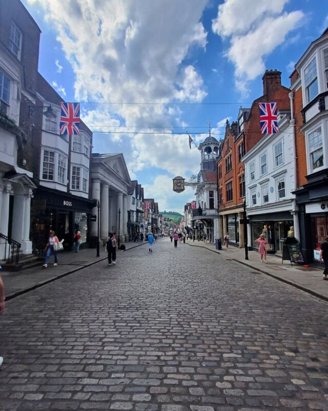 Union Jack flags are up on the High Street ready for VE Day celebrations next week, including our vintage tea party on Wednesday! 🫖 🇬🇧 Wishing everyone a wonderful Bank Holiday weekend. 

#guildford #surrey #highstreet #veday80 #veday #vedaycelebrations #teaparty #vintagemusic #livemusic  #may #mayinsurrey #whatson #communityhub #artseducationcommunity